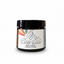 Jar of Alpine Gold tallow balm on a white background